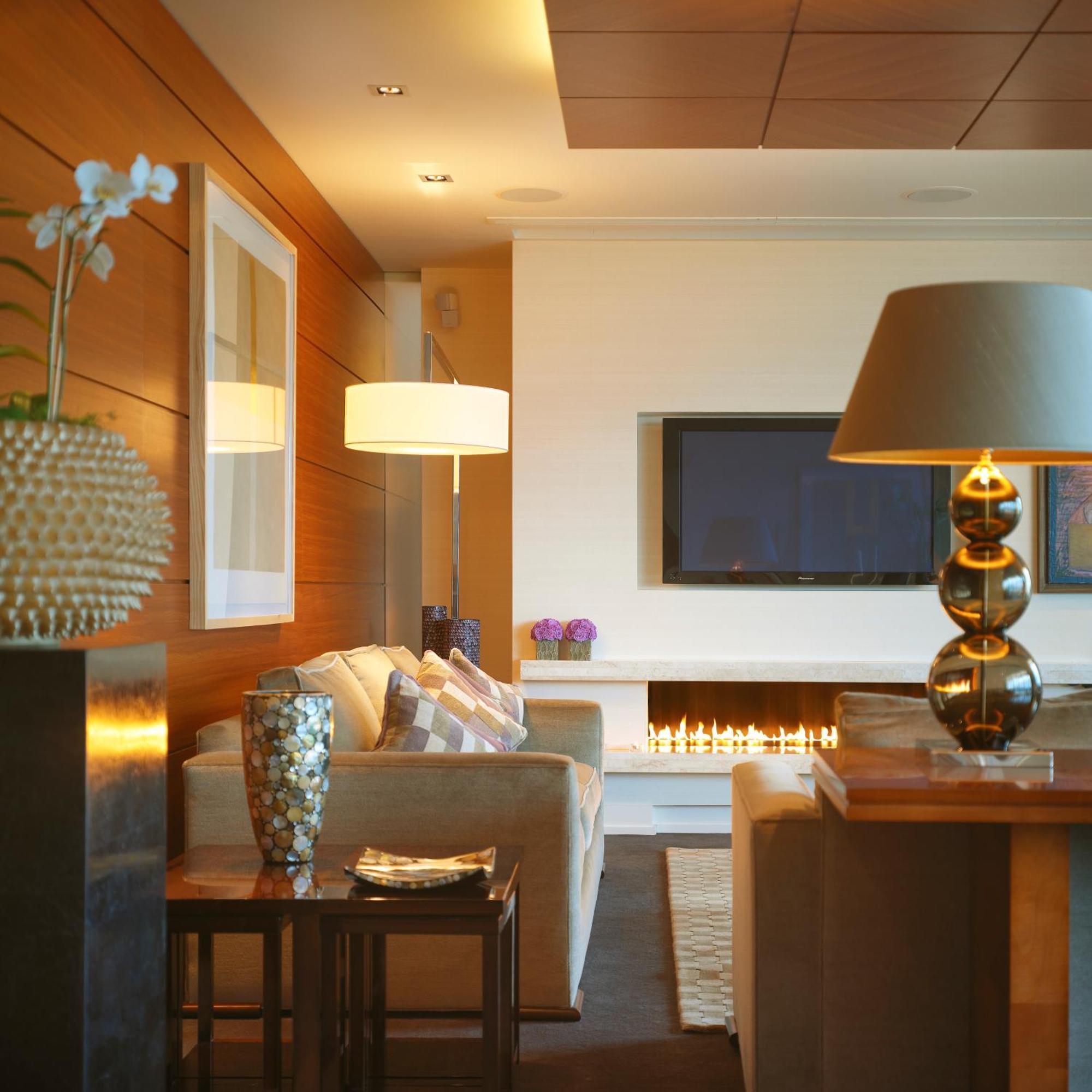 Aghadoe Heights Hotel & Spa Fossa Quarto foto A living room with a fireplace